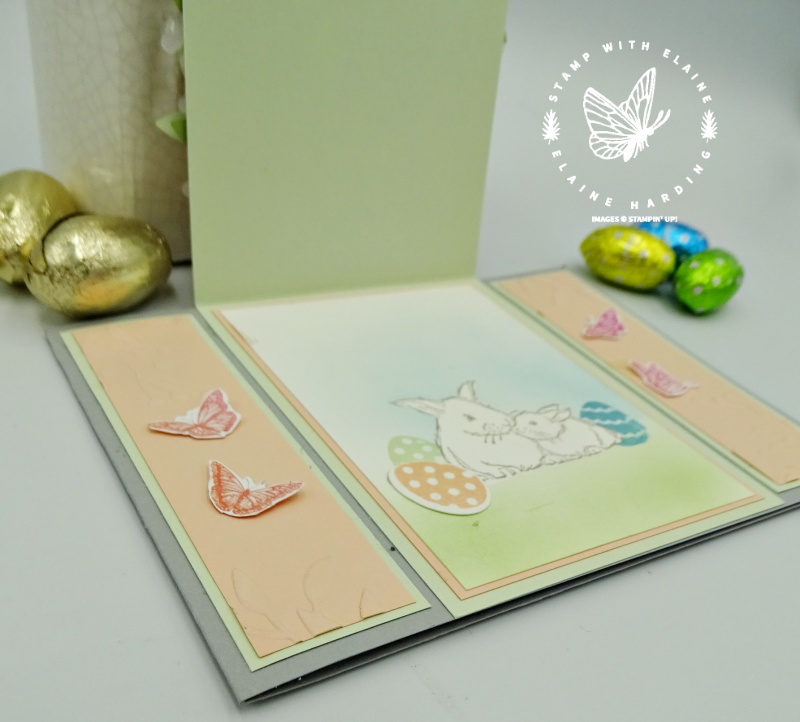 Indide the fun fold easter card showing blended background and rabbits