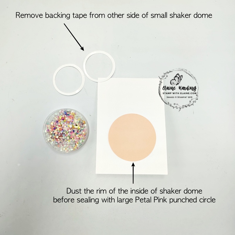 Remove backing tape from other side, seal shaker dome with petal pink circle.