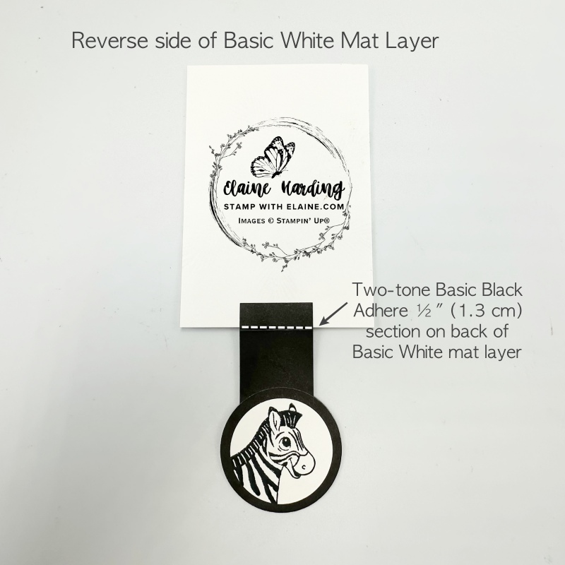 Reverse side of Basic White Mat layer with attached flip flap mechanism