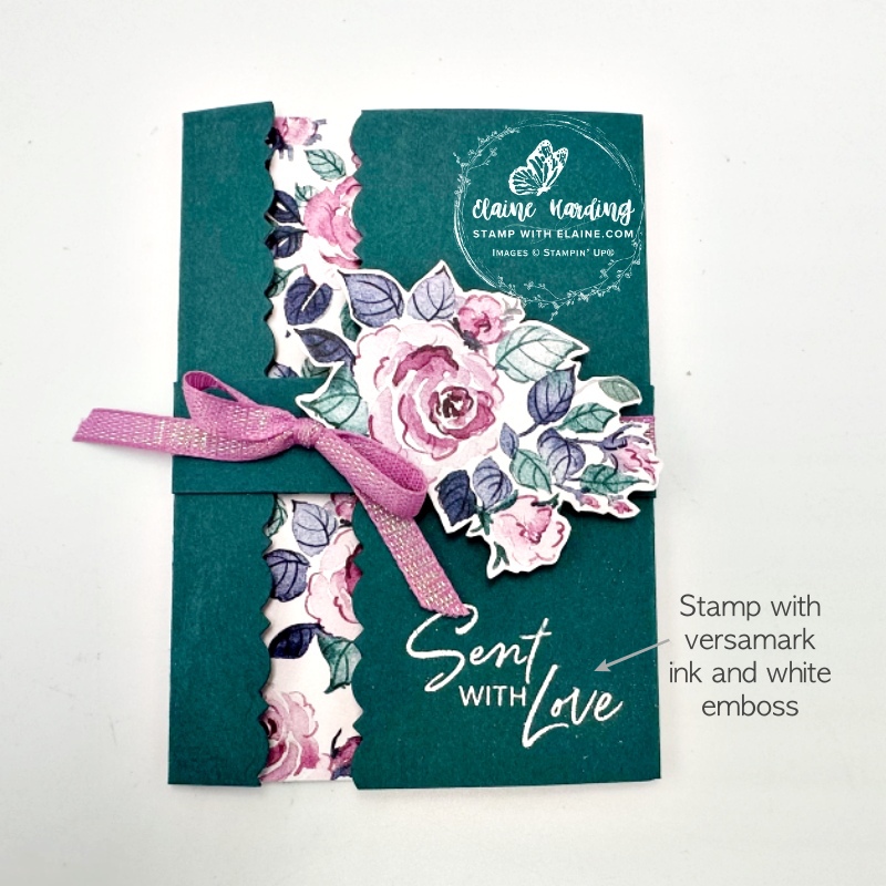 white emboss sentiment on wider panel on card front when closed