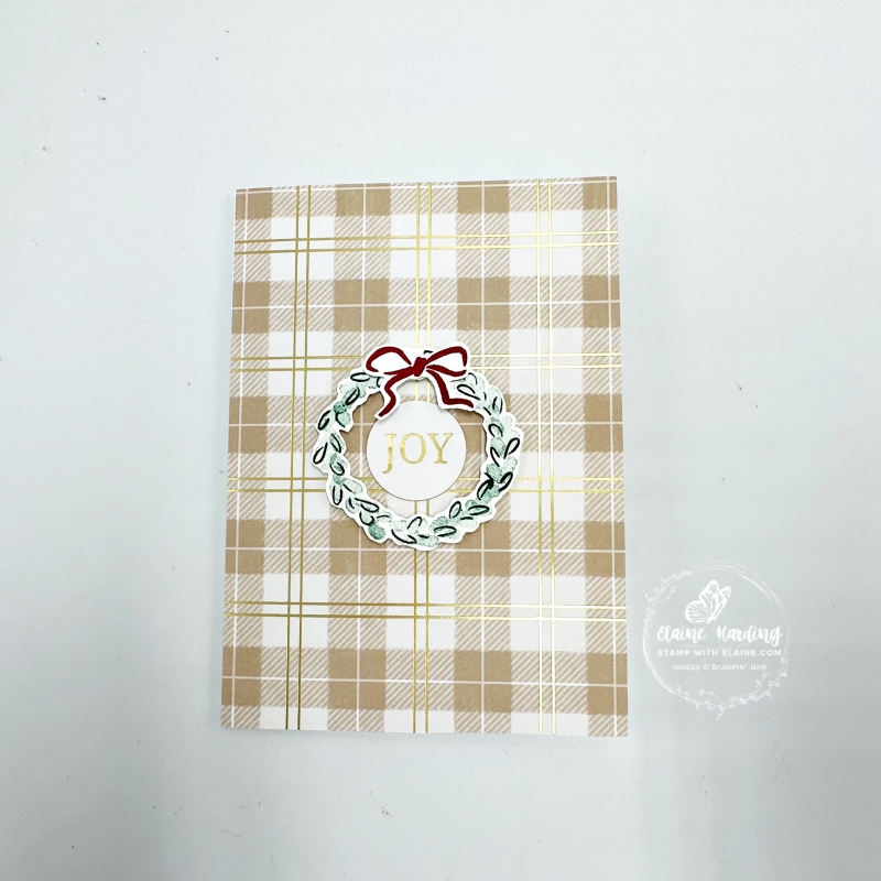 altered plaid card and wreath with Gift of Joy