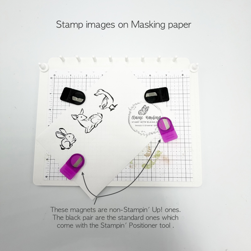 stampin' positioner tool with stamped images on masking paper